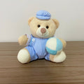Ursinho De Pelúcia Com Brinquedo (Azul Claro) - 12cm